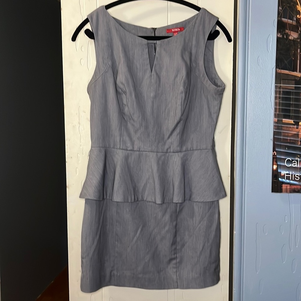 Grey mini dress with peplum.